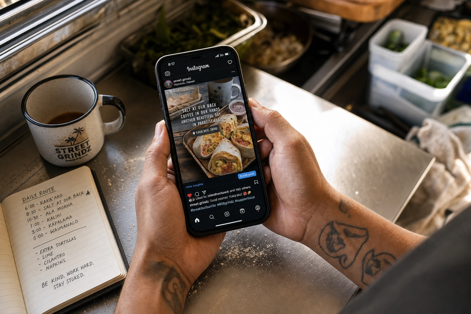 Food truck owner composing a daily location post on a smartphone next to morning prep — low-effort food truck marketing in action