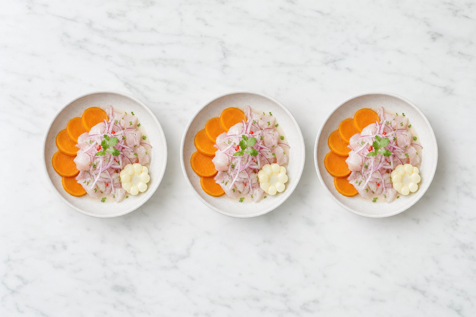 Consistent Peruvian food images: three matching ceviche bowls in a row on white marble