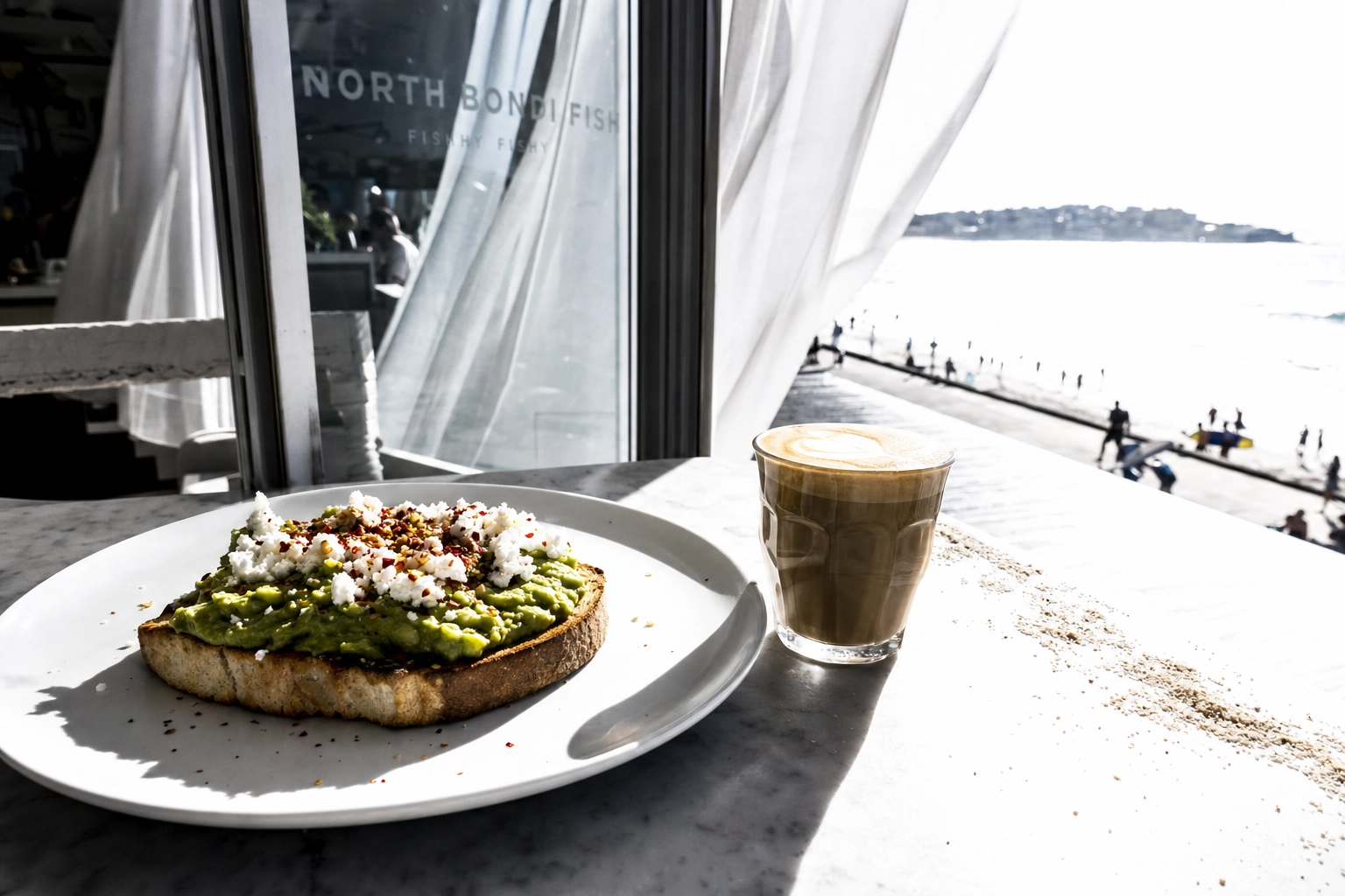 Beachfront cafe table in harsh midday Sydney sun showing the lighting challenge for food photographers