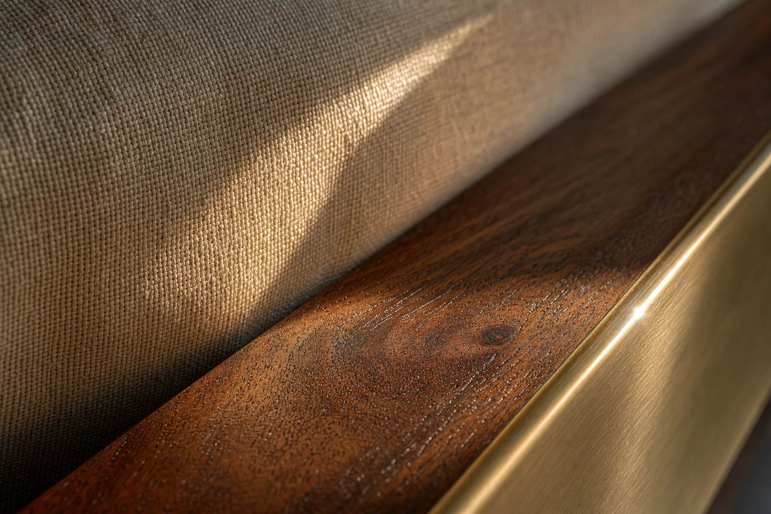 Extreme macro of linen, walnut, and brass interior textures showing the razor-sharp detail of true 4K resolution