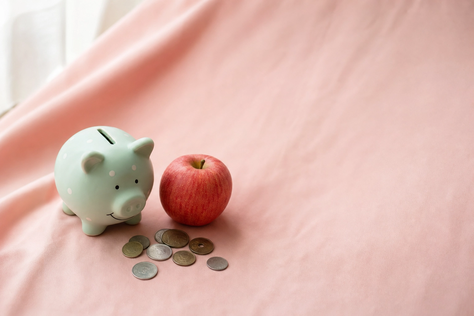 Pastel piggy bank with coins symbolizing the free pricing model and value question of Speakometer English app